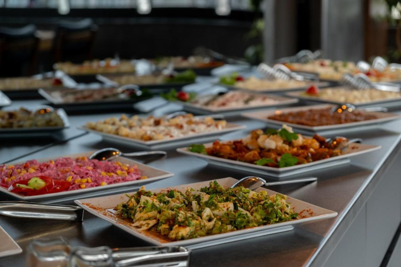 Rhisos Otel รีเซ ภายนอก รูปภาพ